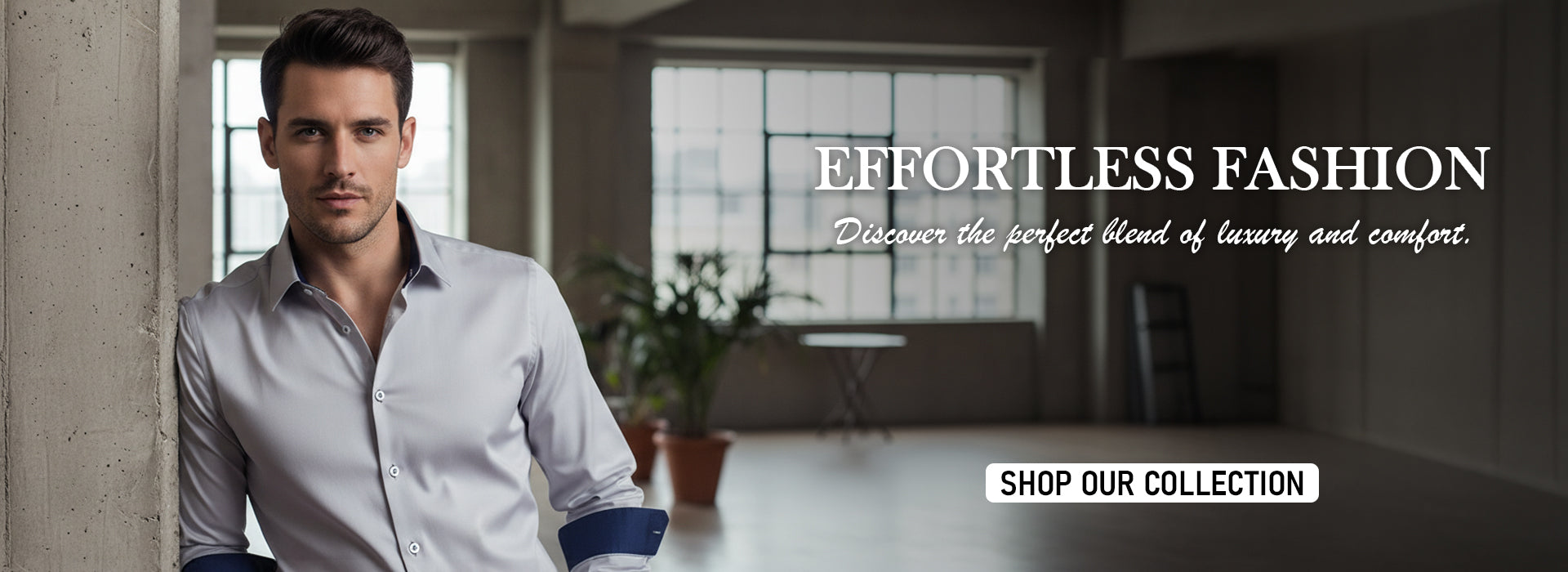 Man in a white shirt with rolled-up sleeves standing in a modern room with text about effortless fashion.slider_item_HdQwCW